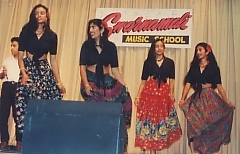 A group of young dancers entertains the crowd