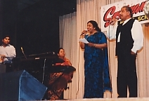 Karu and wife Ramani sing a duet.