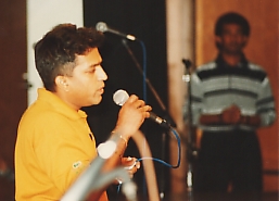 Lalith on stage entertaining the audience