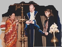 Me lighting the traditional lamp with Dandenong Mayor Greg Harris  and his wife to inaugurate the musical evening